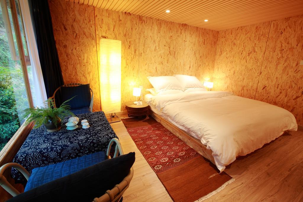 Tong Sang Art Hotel Liping Szoba fotó