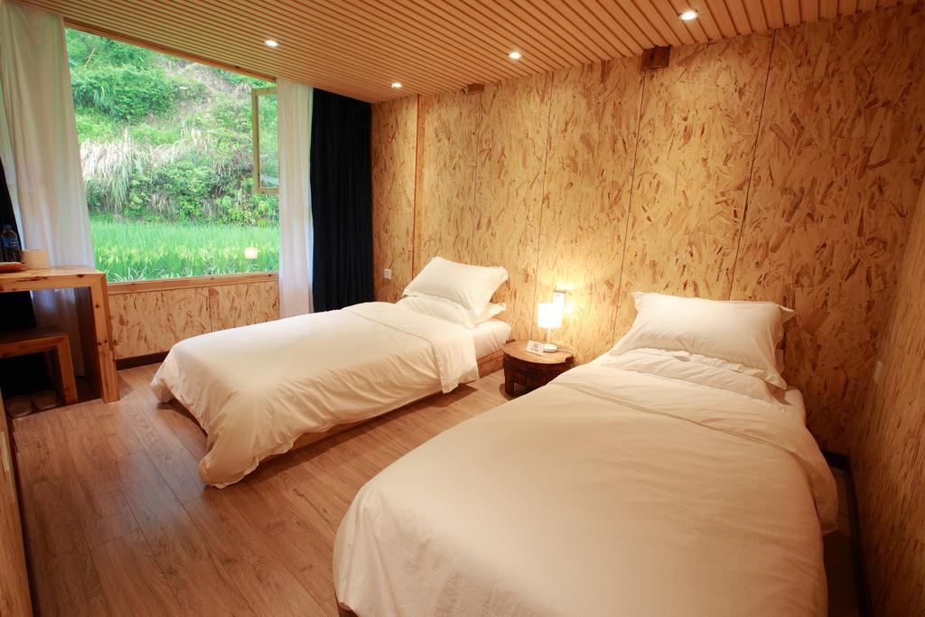 Tong Sang Art Hotel Liping Szoba fotó